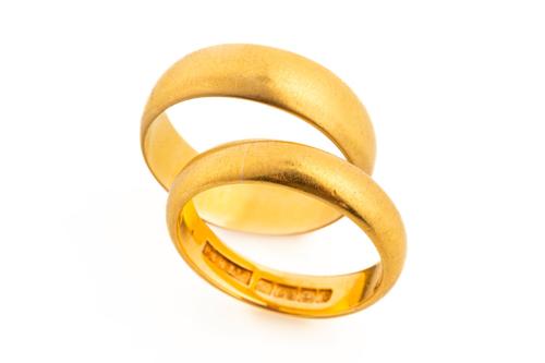 TWO 22CT GOLD WEDDING RINGS (3)