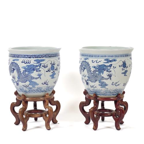 A PAIR CHINESE BLUE AND WHITE CERAMIC JARDINIÈRES (4)