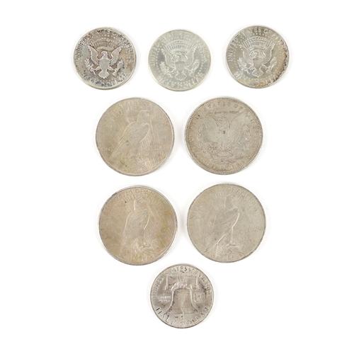 A GROUP OF AMERICAN COINS (8)