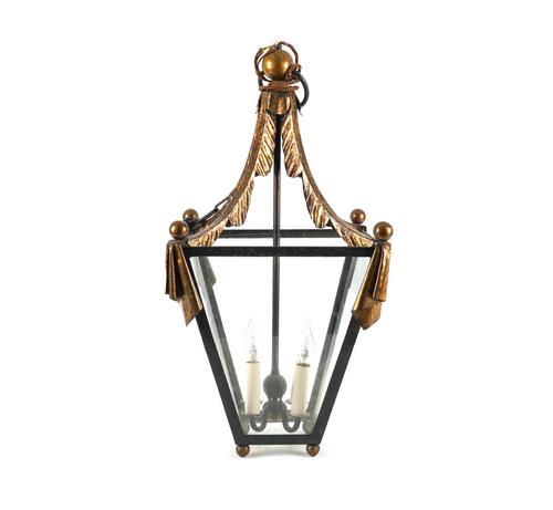 A FRENCH GILT AND BLACK DECORATED IRON LANTERN
