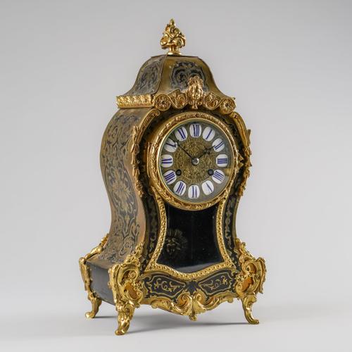 A FRENCH BOULLE MANTEL CLOCK