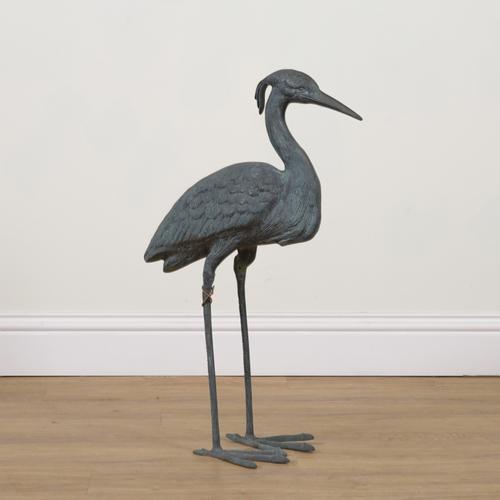 A BRONZE FIGURE OF A STANDING HERON