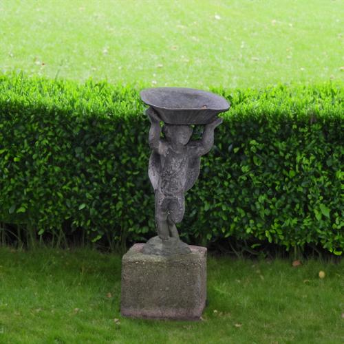 A LEAD FIGURAL BIRD BATH