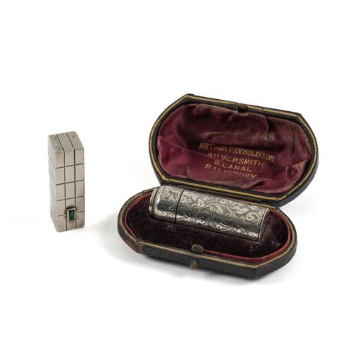 A SILVER CASED SMELLING SALTS/SCENT BOTTLE AND A GREEN PASTE SET SLIDING LIPSTICK (2)