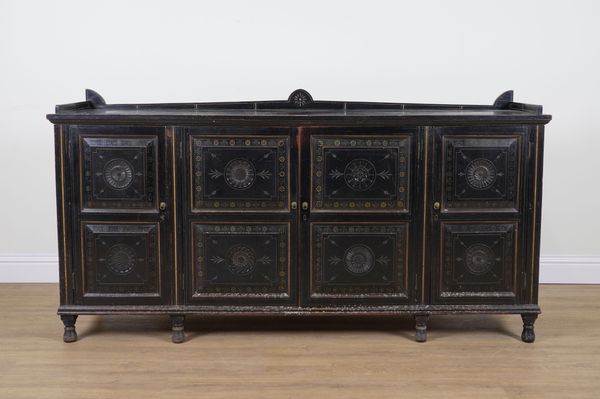 AN AESTHETIC MOVEMENT BLACK LACQUER AND POLYCHROME PAINTED FOUR DOOR SIDE CABINET