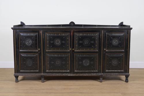 AN AESTHETIC MOVEMENT BLACK LACQUER AND POLYCHROME PAINTED FOUR DOOR SIDE CABINET