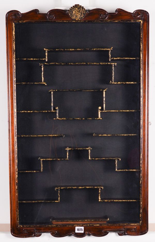 A HARDWOOD PARCEL-GILT SNUFF BOTTLE WALL CABINET