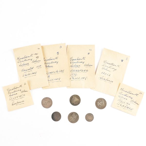 A GROUP OF TWELVE SILVER 19TH CENTURY TOKENS (12)