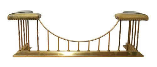 A POLISHED BRASS CLUB FENDER