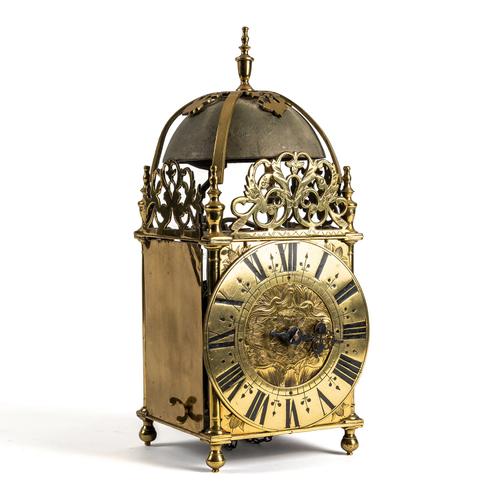 A BRASS LANTERN CLOCK