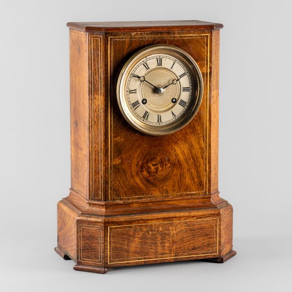 A FRENCH ROSEWOOD AND BRASS LINE-INLAID MANTEL CLOCK