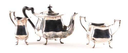 A SILVER THREE PIECE TEA SET
