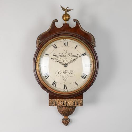 A GILT METAL-MOUNTED MAHOGANY DROP-DIAL WALL CLOCK