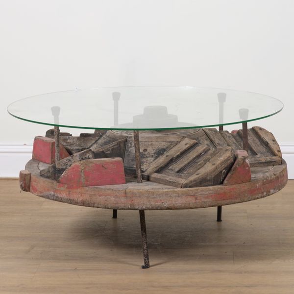 AN INDUSTRIAL HARDWOOD COG COFFEE TABLE