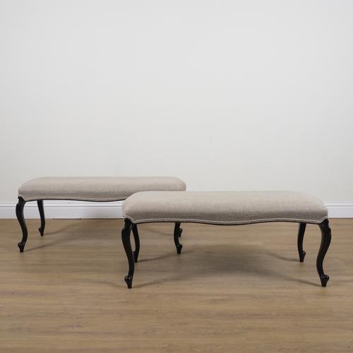 A PAIR OF EBONISED RECTANGULAR FOOTSTOOLS (2)