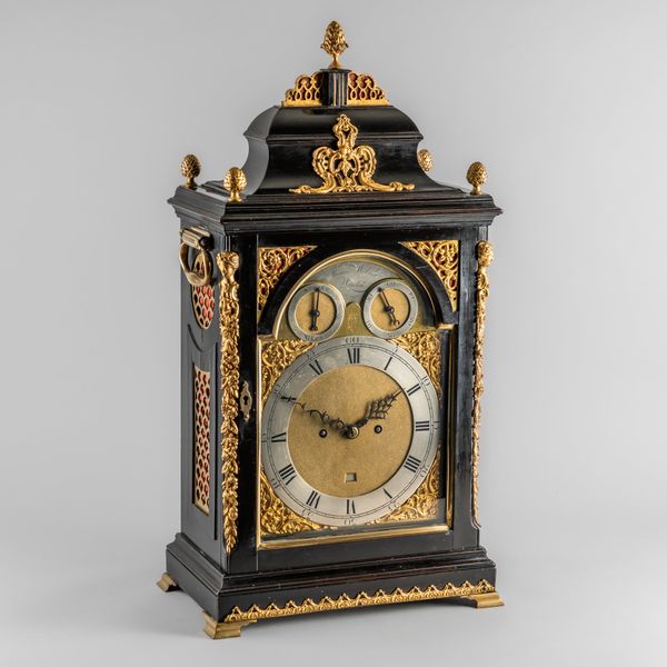 A GEORGE III GILTMETAL-MOUNTED EBONISED STRIKING BRACKET CLOCK