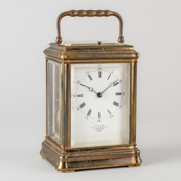 A FRENCH BRASS GORGE CASED STRIKING AND REPEATING CARRIAGE CLOCK