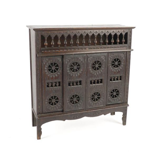 AN APPRENTICE PIECE OF MINIATURE OAK BRETON CUPBOARD