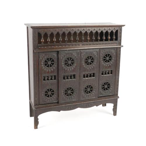 AN APPRENTICE PIECE OF MINIATURE OAK BRETON CUPBOARD