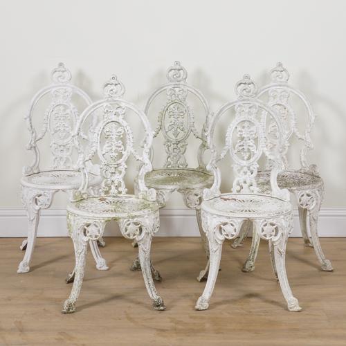 A SUITE OF WHITE PAINTED CAST ALUMINIUM GARDEN FURNITURE (6)