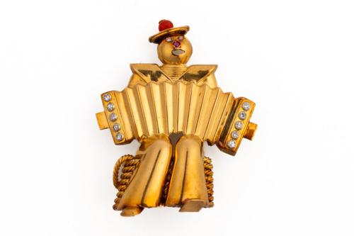 A 1940'S VAN CLEEF AND ARPELS 'SAILOR WITH THE ACCORDION' BROOCH (2)
