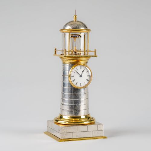 A RARE GILT METAL AND SILVERED AUTOMATON ‘LIGHTHOUSE’ TIMEPIECE WITH DUPLEX ESCAPEMENT