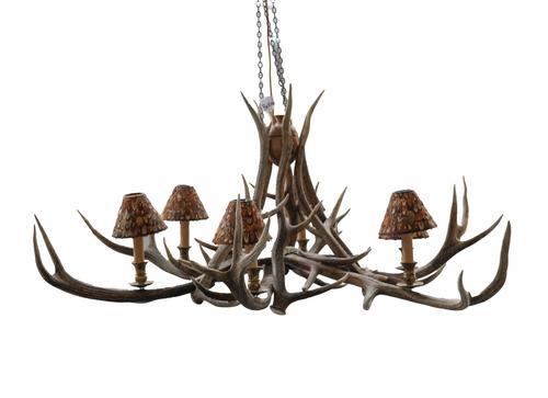 PROBABLY ANTHONY REDMILE: AN ANTLER HORN SIX LIGHT CHANDELIER