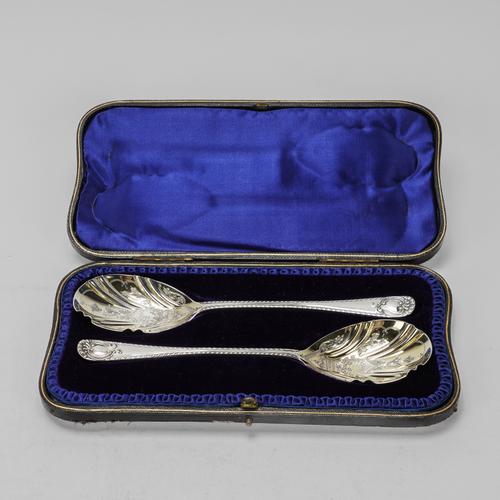 A PAIR OF SILVER SERVING SPOONS