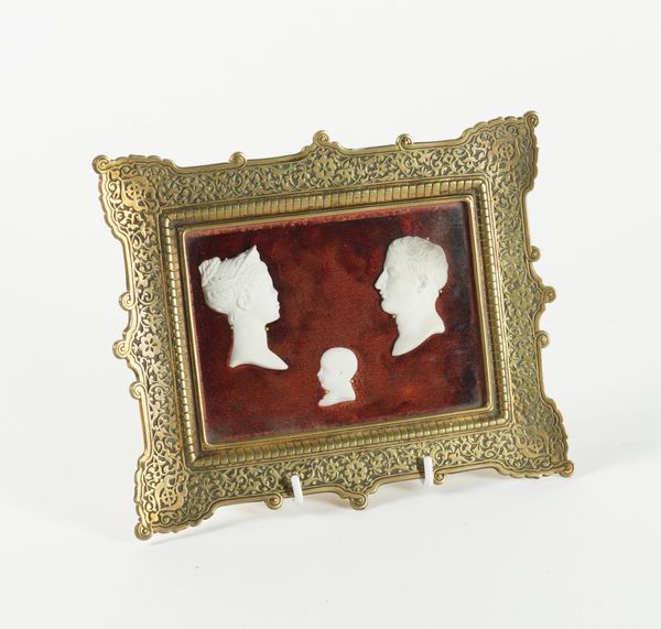 A PLASTER SILHOUTETTE GROUP OF NAPOLEON, JOSEPHINE AND CHILD