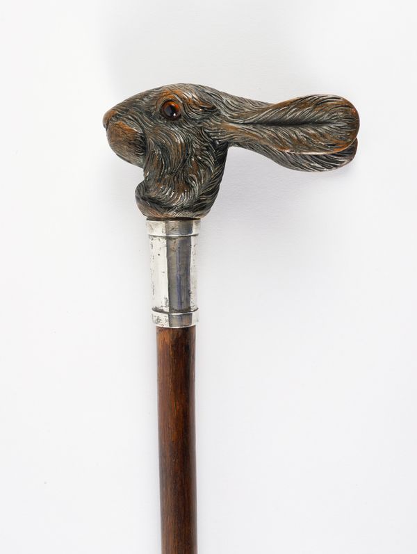 A VICTORIAN CARVED HARE MALACCA WALKING CANE