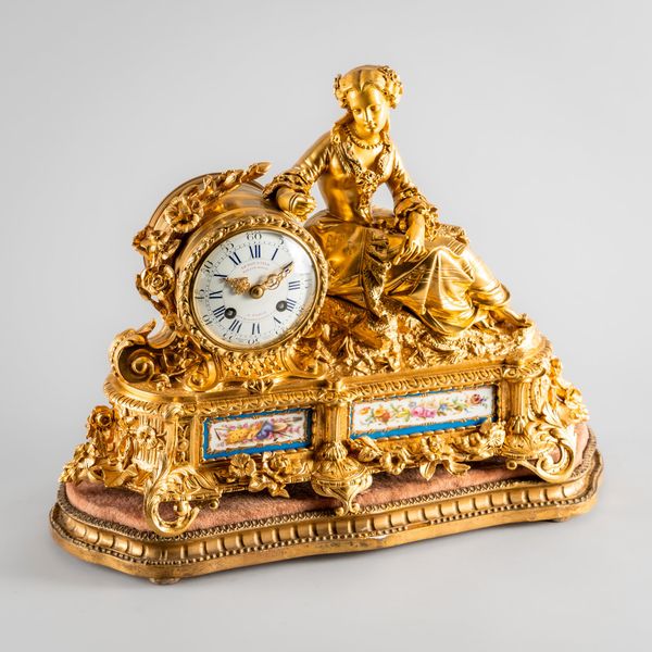 A FRENCH GILT METAL AND SÈVRES STYLE PORCELAIN-MOUNTED MANTEL CLOCK