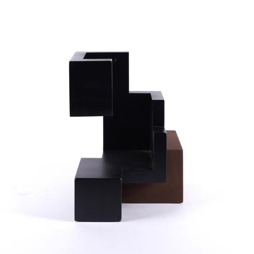 AN ABSTRACT ENAMELLED METAL SCULPTURE