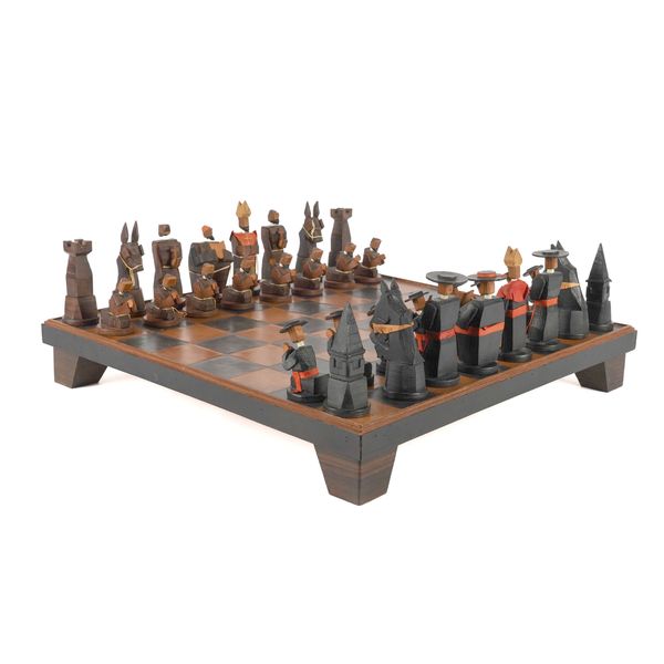 A FLORENTINE MONASTIC LEATHER AND WOOD CHESS SET (33)