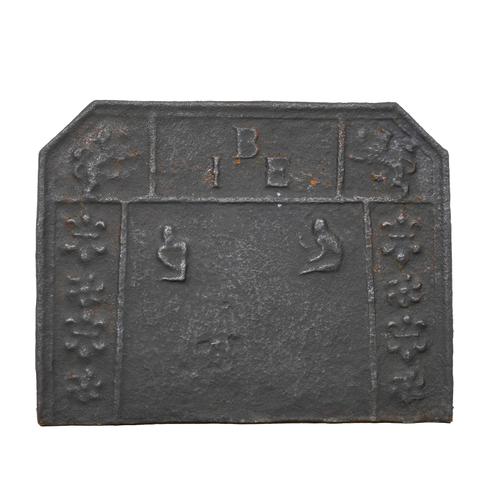 A CAST IRON FIREBACK WITH INITIALS 'IEB'