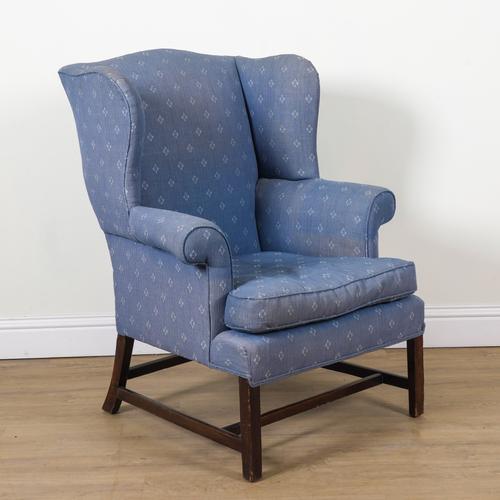 A GEORGE III MAHOGANY FRAMED WINGBACK ARMCHAIR