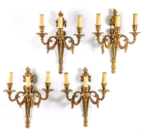 A SET OF FOUR LOUIS XVI STYLE GILT BRONZE THREE BRANCH WALL APPLIQUES (4)