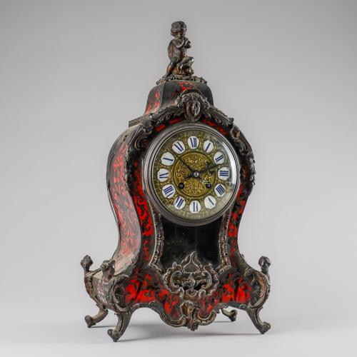 A FRENCH GILTMETAL-MOUNTED BOULLE MANTEL CLOCK