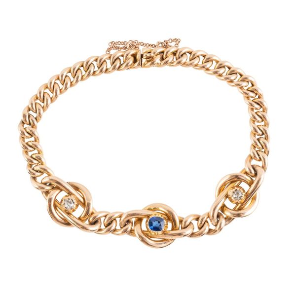 A SAPPHIRE AND DIAMOND CURB LINK BRACELET