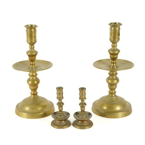 A NEAR PAIR OF DUTCH BRASS ‘HEEMSKIRK’ TYPE CANDLESTICKS (4)