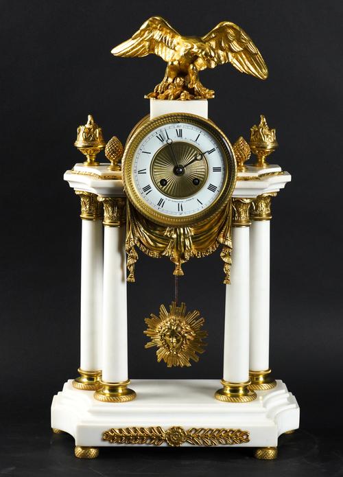 A FRENCH LOUIS XVI STYLE GILT-METAL MOUNTED WHITE MARBLE PORTICO MANTEL CLOCK