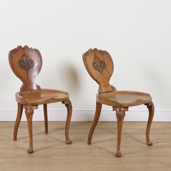 A PAIR OF VICTORIAN AND LATER WALNUT HALL CHAIRS (2)