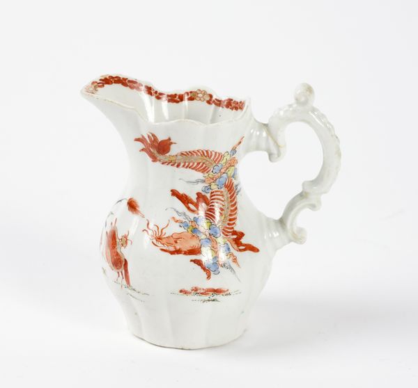 AN EARLY WORCESTER PORCELAIN CREAM JUG