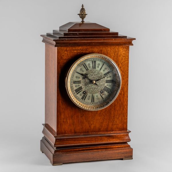 A MAHOGANY ‘TING-TANG’ QUARTER STRIKING BRACKET CLOCK AND BRACKET