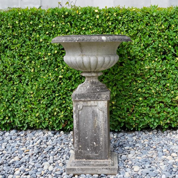 A LARGE RECONSTITUTED STONE JARDINIERE