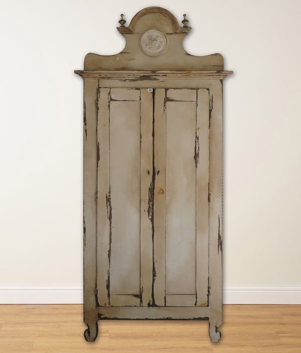 AN EARLY 20TH CENTURY CONTINENTAL  CREAM PAINTED TWO DOOR CUPBOARD