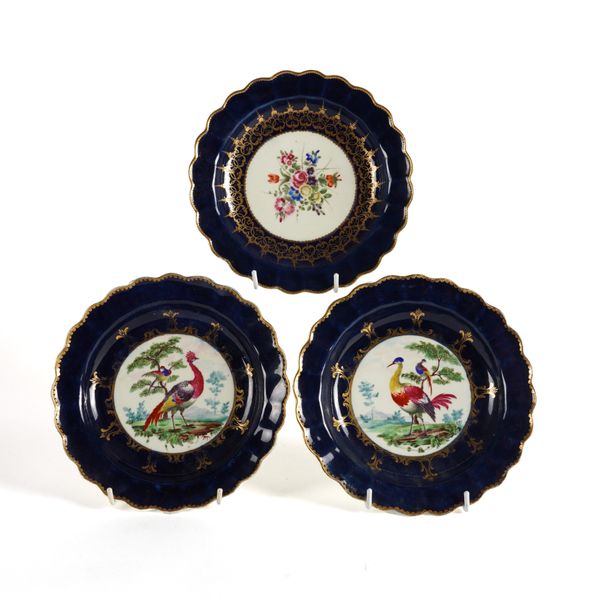 A PAIR OF WORCESTER SCALLOPED-EDGED BLUE GROUND DESSERT PLATES (3)