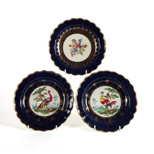 A PAIR OF WORCESTER SCALLOPED-EDGED BLUE GROUND DESSERT PLATES (3)