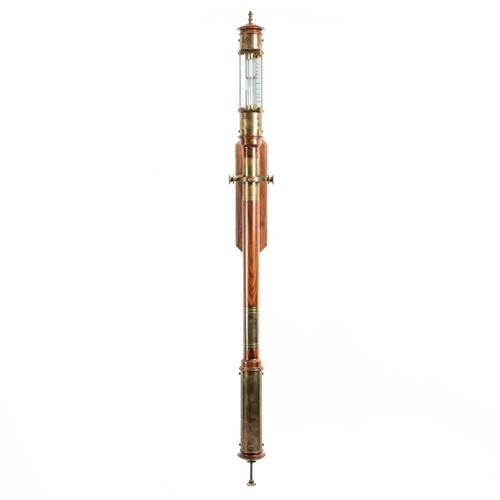 A BRASS-MOUNTED STINKWOOD MARINE BAROMETER