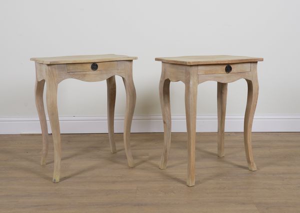 OKA; A PAIR OF HARDWOOD SERPENTINE SINGLE DRAWER BEDSIDE TABLES (2)