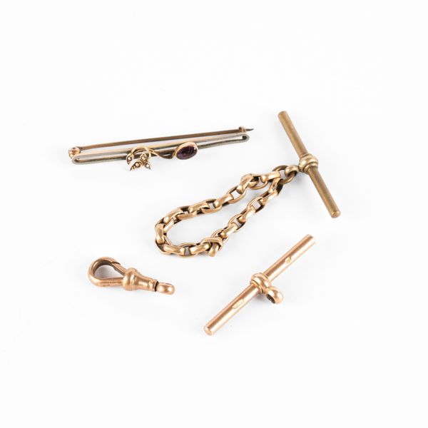 A collection of yellow metal jewellery